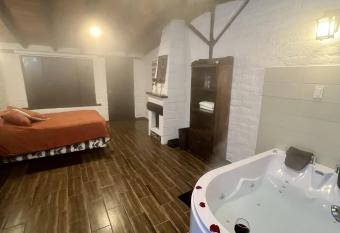 Estancia De La Campi  a has rooms with a private hot tub