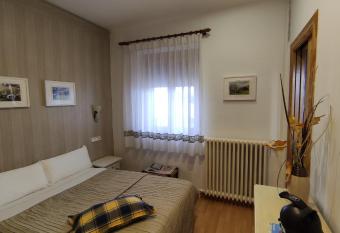 Hostal Escart  n allows 18 year olds to book a room