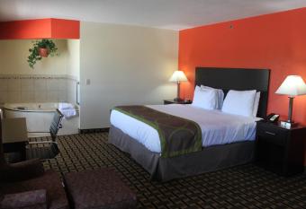 AmericInn by Wyndham West Burlington has rooms with a private hot tub