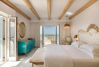 Mitsis Laguna Resort & Spa has rooms with a private hot tub