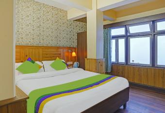 Treebo Trend The Pinewood Hotel has Smoking rooms