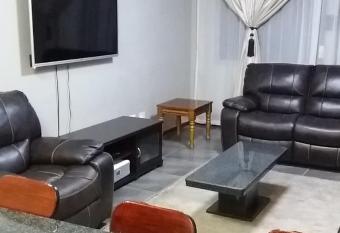 Executive 2 bed Apartment, free WIFI and DSTV has rooms with a private hot tub