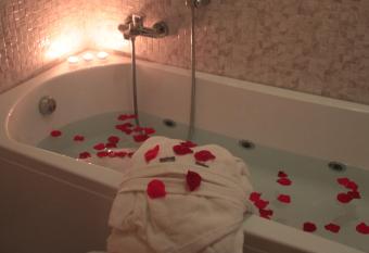 Hotel Nuv   has rooms with a private hot tub