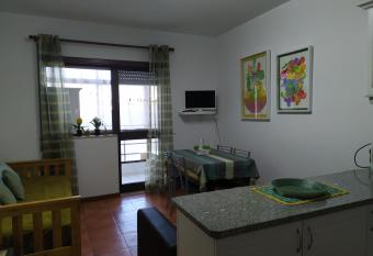 Casa de Praia da L   has Balcony rooms