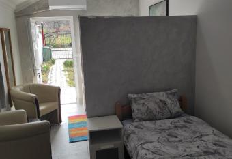 Vila Mila Riverside Apartments has rooms with a private hot tub