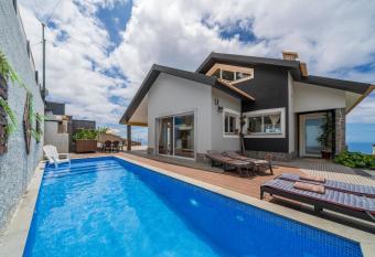 Villa Sea Colors by An Island Apart allows 18 year olds to book a room