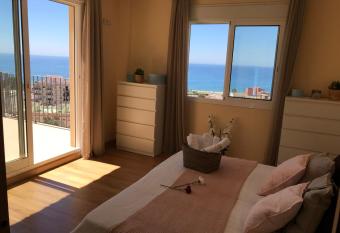Rooms in Seafront Villa has rooms with a private hot tub
