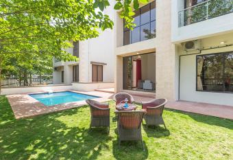 StayVista s Greenwoods Villa 8 - City-Center Villa with Private Pool, Terrace, Lift & Ping-Pong Table allows 18 year olds to book a room