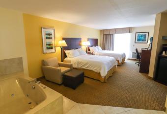 Holiday Inn Express St Ignace-Lake Central, an IHG Hotel has rooms with a private hot tub