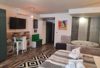 Romantic Jacuzzi Luxury Apartment has rooms with a private hot tub