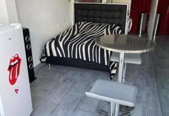 Naturist Paradise in    Swinging Cap    allows 18 year olds to book a room