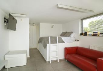 the coolest loft and terrace-varkiza sea view has Balcony rooms