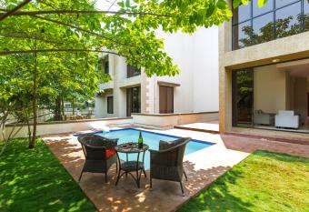 StayVista s Greenwoods Villa 6 - City-Center Villa with Private Pool, Terrace, Lift & Ping-Pong Table allows 18 year olds to book a room