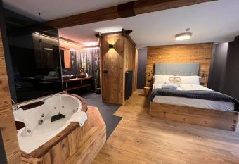 Hotel Rio Bianco has rooms with a private hot tub