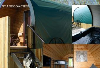 Dog Friendly Stagecoach Glamping Pod with Hot Tub has rooms with a private hot tub