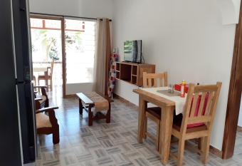 One bedroom appartement with sea view enclosed garden and wifi at Baie Sainte Anne 5 km away from the beach has Balcony rooms