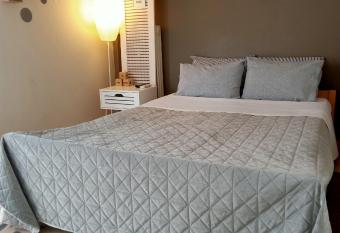 Comfy Studio has Balcony rooms