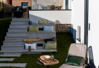 Villa Natura luxury apartments has rooms with a private hot tub