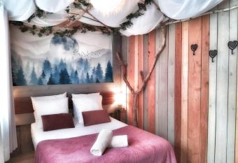 L   chapp  e belle    l   tang d Anty -appartement has Balcony rooms