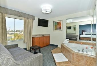 Best Western Plus Orange County has rooms with a private hot tub