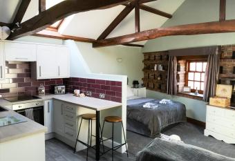 The Carriage House, Studio 3A has Balcony rooms