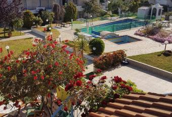 Elina s cozy house sw. pool has Balcony rooms