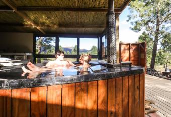 Avani Lodge Private Nature Reserve has rooms with a private hot tub