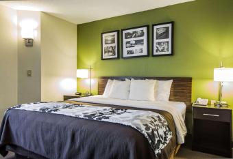 Sleep Inn Airport has rooms with a private hot tub