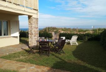 Sea front apartment in Platja Pals with terrace and parking allows 18 year olds to book a room