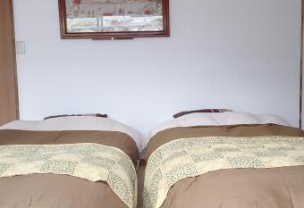 First Hatsukaichi has rooms with a private hot tub