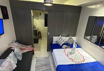 Green Residences 1 Bedroom Condotel with Balcony in Metro Manila Free Breakfast for 2 has Balcony rooms