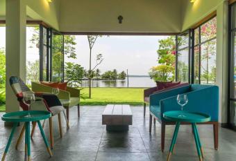Cheppanam House with Backwater View and Pvt Lawn by StayVista has Balcony rooms