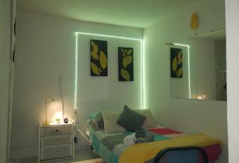 Yellow-Gray Tropical Studio has Balcony rooms