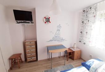 S  onecznik Jastarnia. Domek na Zdrojowej. has Balcony rooms