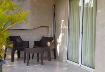 Habitaci  n Equipada en Posada Villa Mayo a 5 minutos de Playa Parguito has Balcony rooms