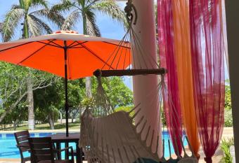 Casa de las Flores tropical has Balcony rooms