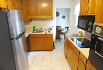 A Touch of Madagascar in Fort Walton Beach with HEATING POOL allows 18 year olds to book a room