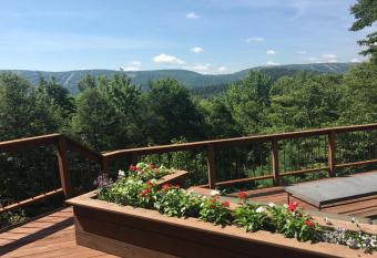 Mountain house has rooms with a private hot tub