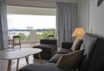 Beachfront Unit at Seri Bulan , Pantai Teluk Kemang has Balcony rooms