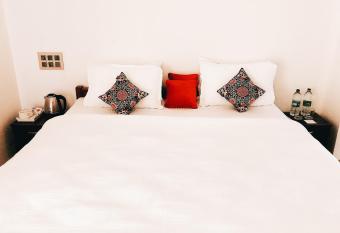 Zen Kochi Boutique Home has Balcony rooms