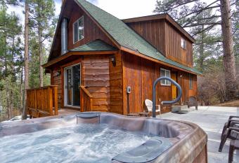 Living Log Cabin-1494 by Big Bear Vacations has rooms with a private hot tub