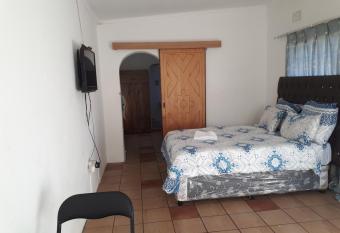 C - Land Guest house allows 18 year olds to book a room