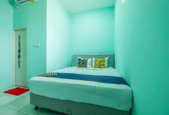 SPOT ON 1889 Mbuahpage allows 18 year olds to book a room