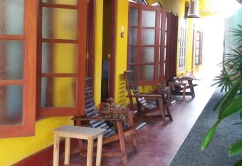 Malika s Yellow House has Balcony rooms