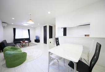 NEYAGAWA STATION HOUSE has Balcony rooms