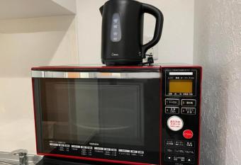 Villa Awase 111 has rooms with a private hot tub