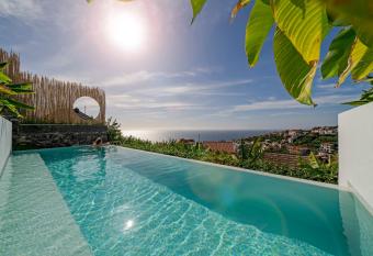 Casas da Vargem shared swimming pool by An Island Apart allows 18 year olds to book a room