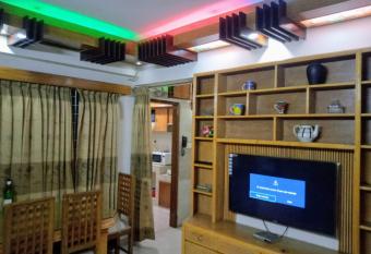 Blue Star Sun Serviced Apartment has rooms with a private hot tub