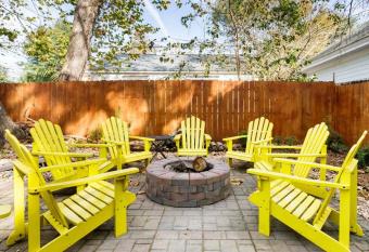 Vibrant, Colorful Condo Building with Backyard Firepit and Games has Balcony rooms