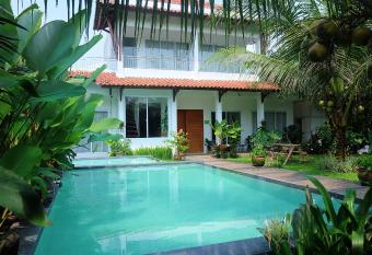 Villa Prambanan Jogja with Private Swimming Pool by Simply Homy has Balcony rooms